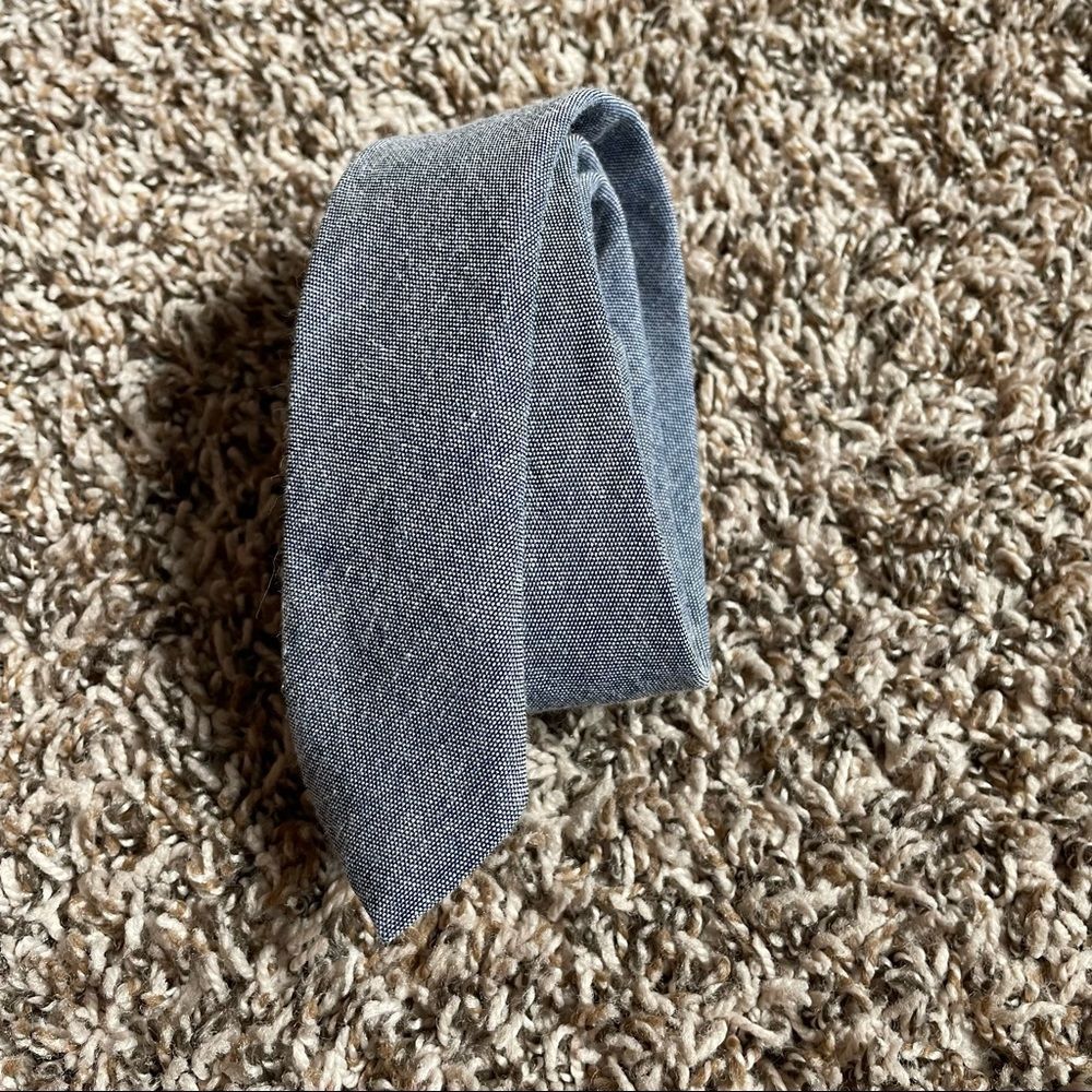 Little boy gray tie